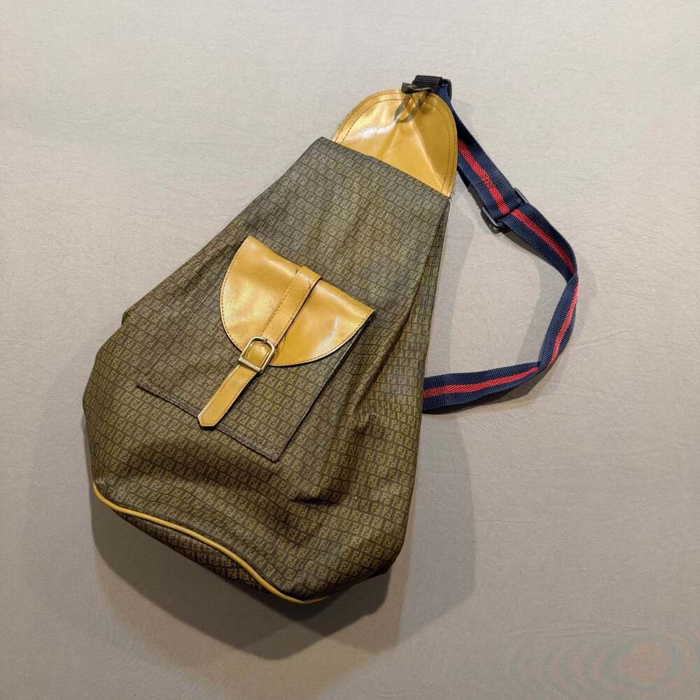 Vintage Monogram Print Canvas Sling Backpack